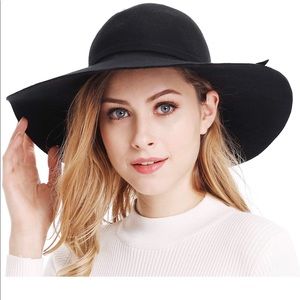 Black wool wide brim floppy hat.